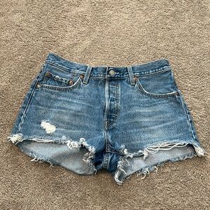 Levi’s 501 High Waisted button fly distressed jean shorts